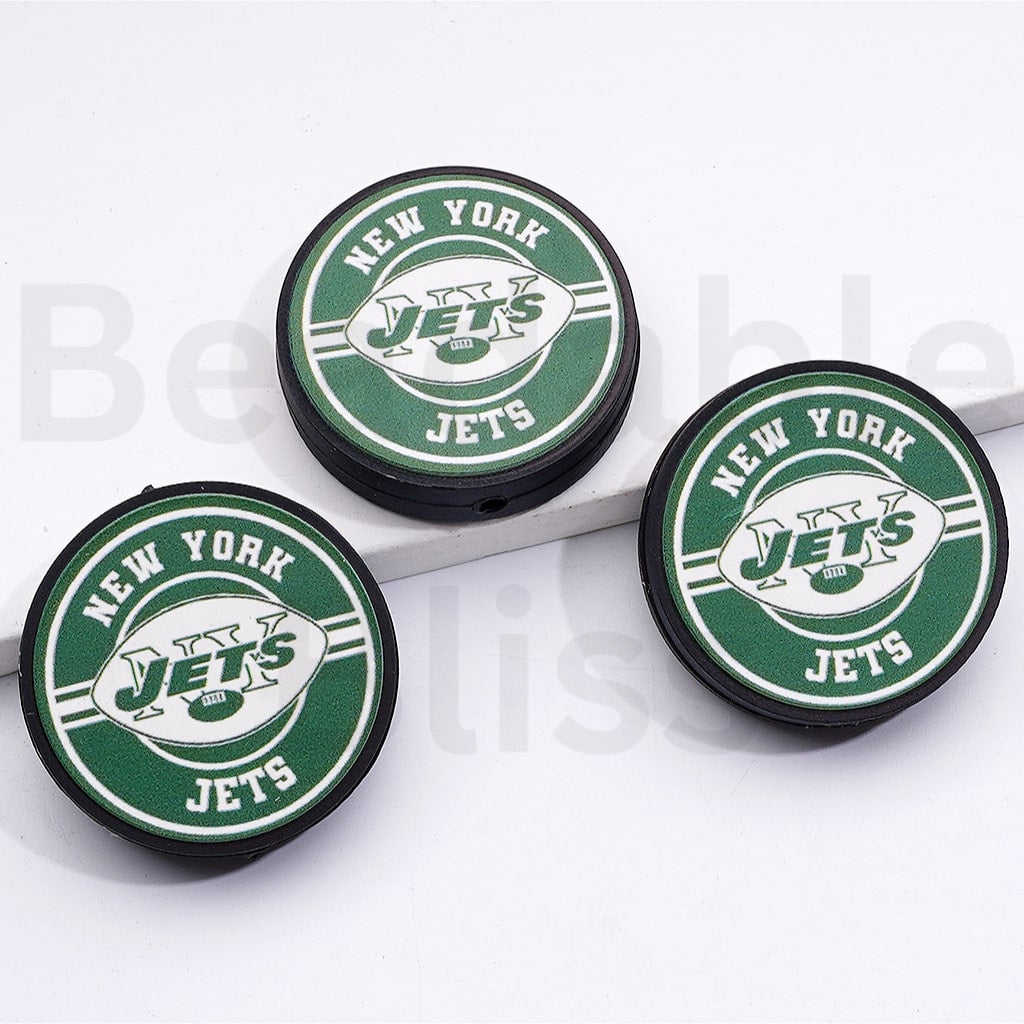 Three New York Jets logo coasters on a white surface

