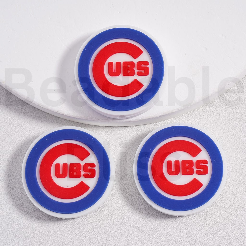 Three Chicago Cubs logo coasters on a white surface with ' beadablebliss' branding.

