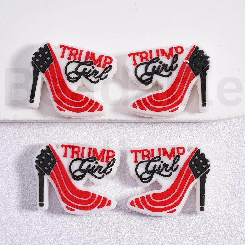 Four red high-heeled shoes with 'TRUMP Girl' text on a white background.

