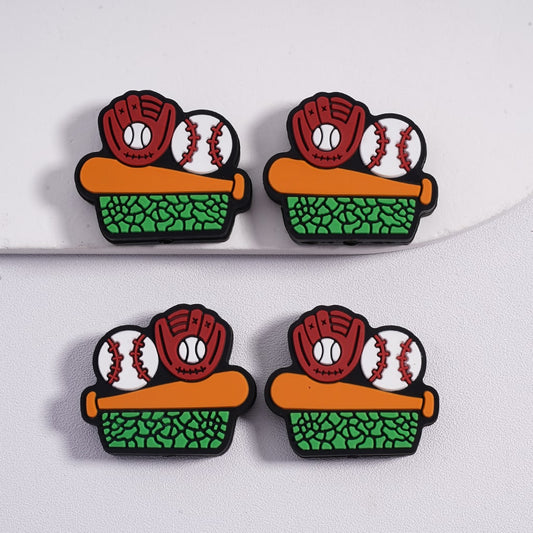 Four baseball-themed earrings on a white background

