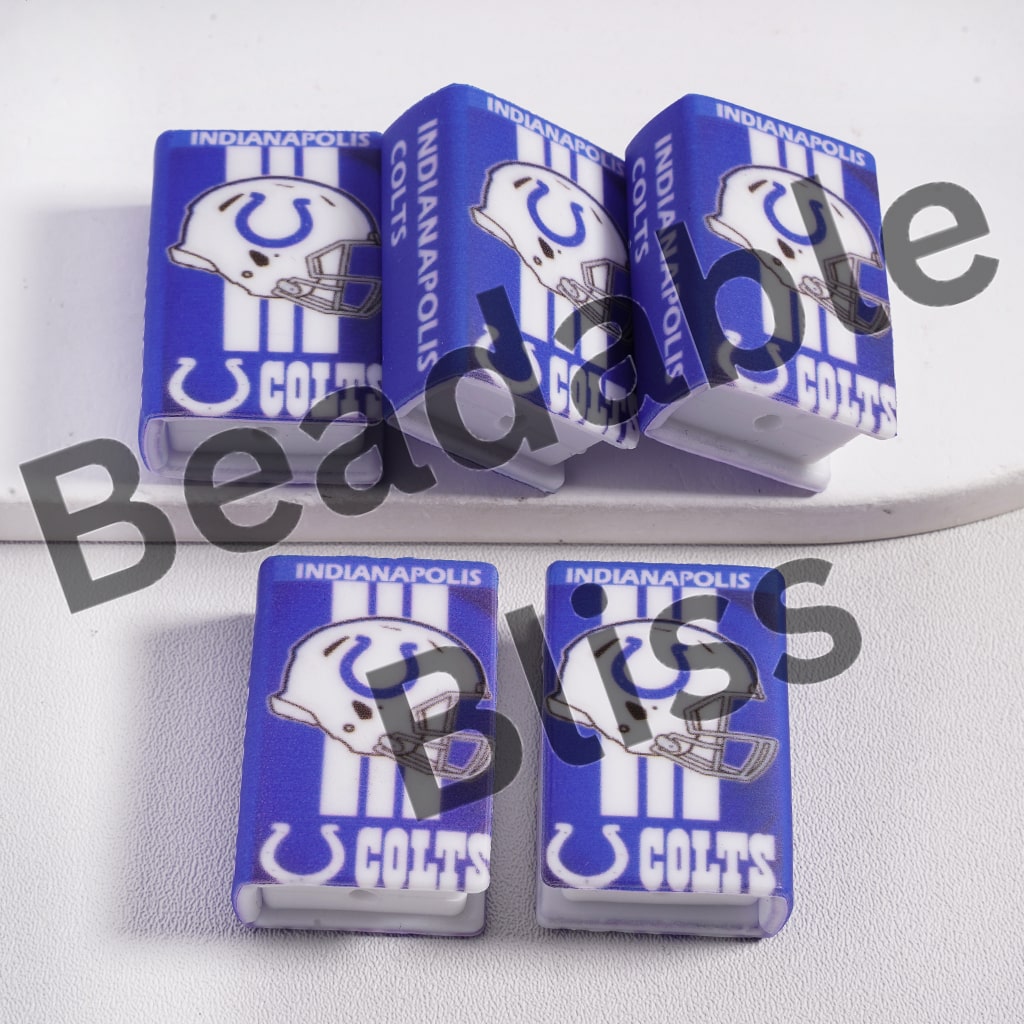 Four Indianapolis Colts phone stands on a white surface with 'beadablebliss' branding.

