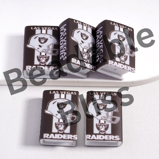 Las Vegas Raiders coasters on a white surface with 'beadablebliss' branding.

