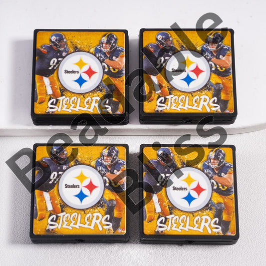 Four coasters with Pittsburgh Steelers logo and players on a white background


