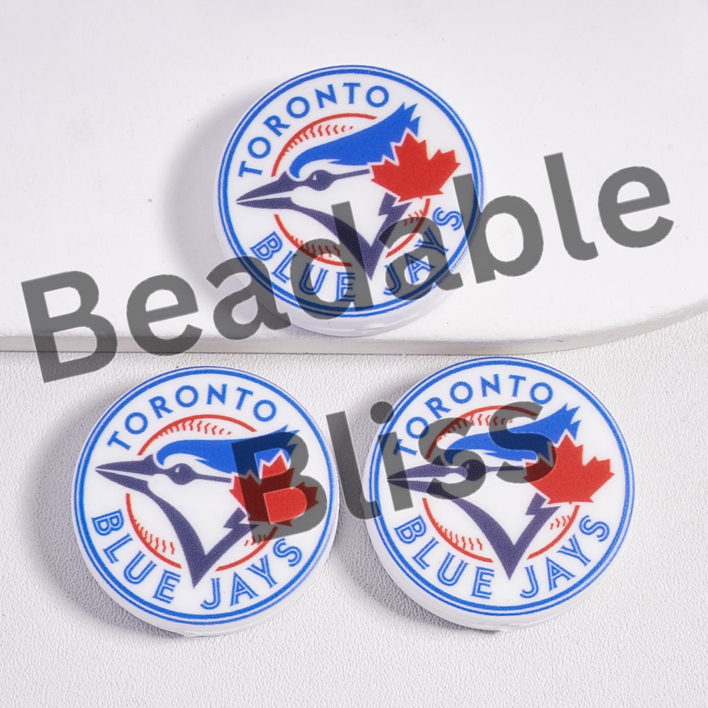 Three Toronto Blue Jays logo pins on a white background with 'beadablebliss' text.

