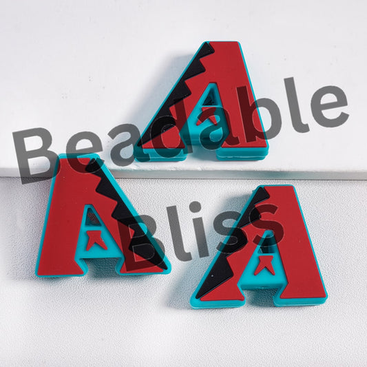 Three red and blue geometric earrings on a white background with 'beadablebliss' text.