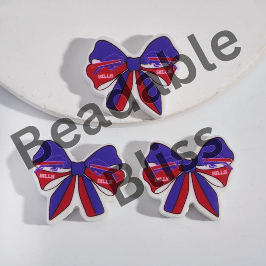 Three decorative bows with red and blue ribbons on a white background, branded 'handsontosupply'.