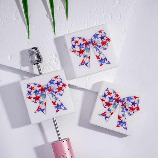 Silicone Focal Beads with Red Blue White Star Patterns in Bowknot, Flat Square Shape