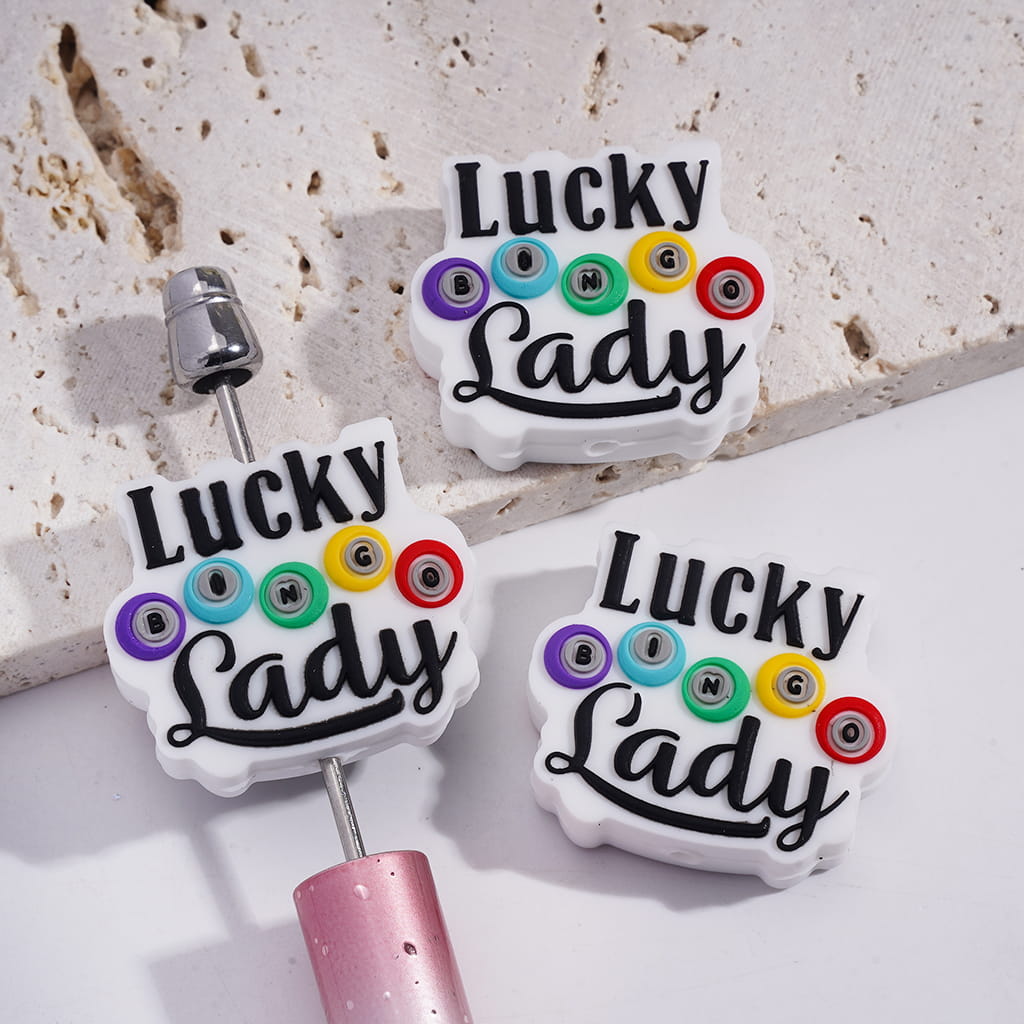 Silicone Focal Beads with Text "LUCKY BINGO Lady" on White Background