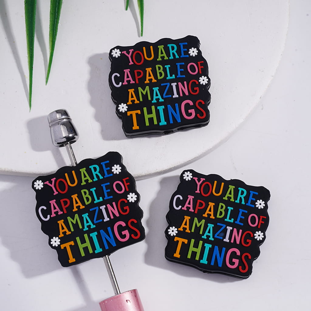 Silicone Focal Beads with Text "YOU ARE CAPABLE OF AMAZING THINGS" and White Flowers