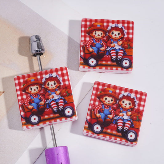 Silicone Focal Beads with Horror Baby Doll Sitting on Small Platform Trolley, Flat Square Shape