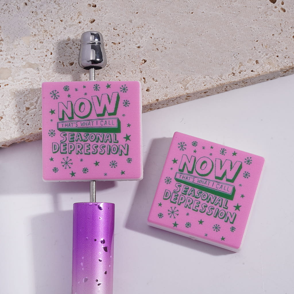 Silicone Focal Beads with Snowflake Star and Text "NOW THAT'S WHAT I CALL SEASONAL DEPRESSION" on Pink Background, Flat Square Shape