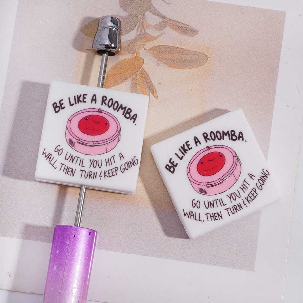 Silicone Focal Beads with Pink Robovac and Text "GO UNTIL YOU HIT A WALL, THEN TURN & KEEP GOING, Flat Square Shape