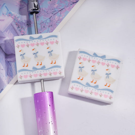Silicone Focal Beads with Three White Duck Wearing Blue Bowtie and Flower Edges, Flat Square Shape