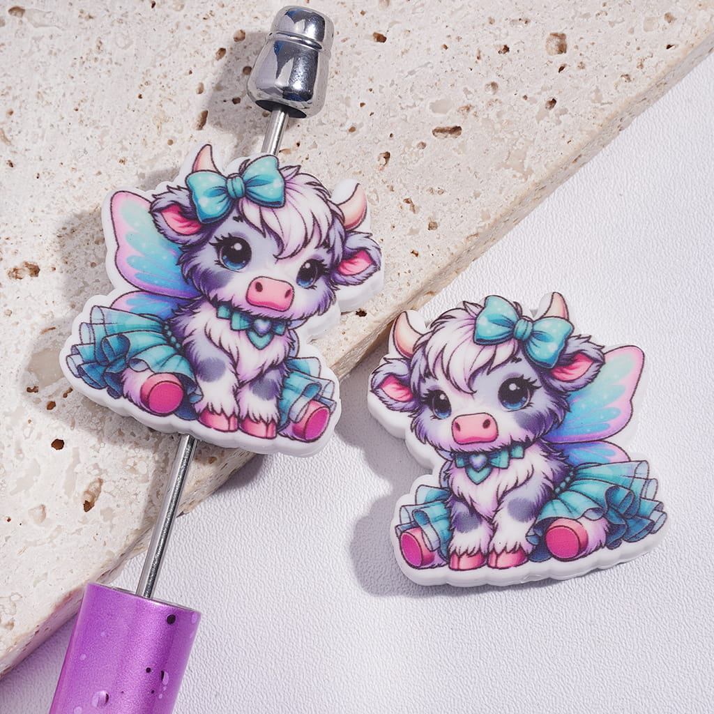 Silicone Focal Beads Pretty Highland Cow with Blue Gauzy Skirt and Butterfly Wings
