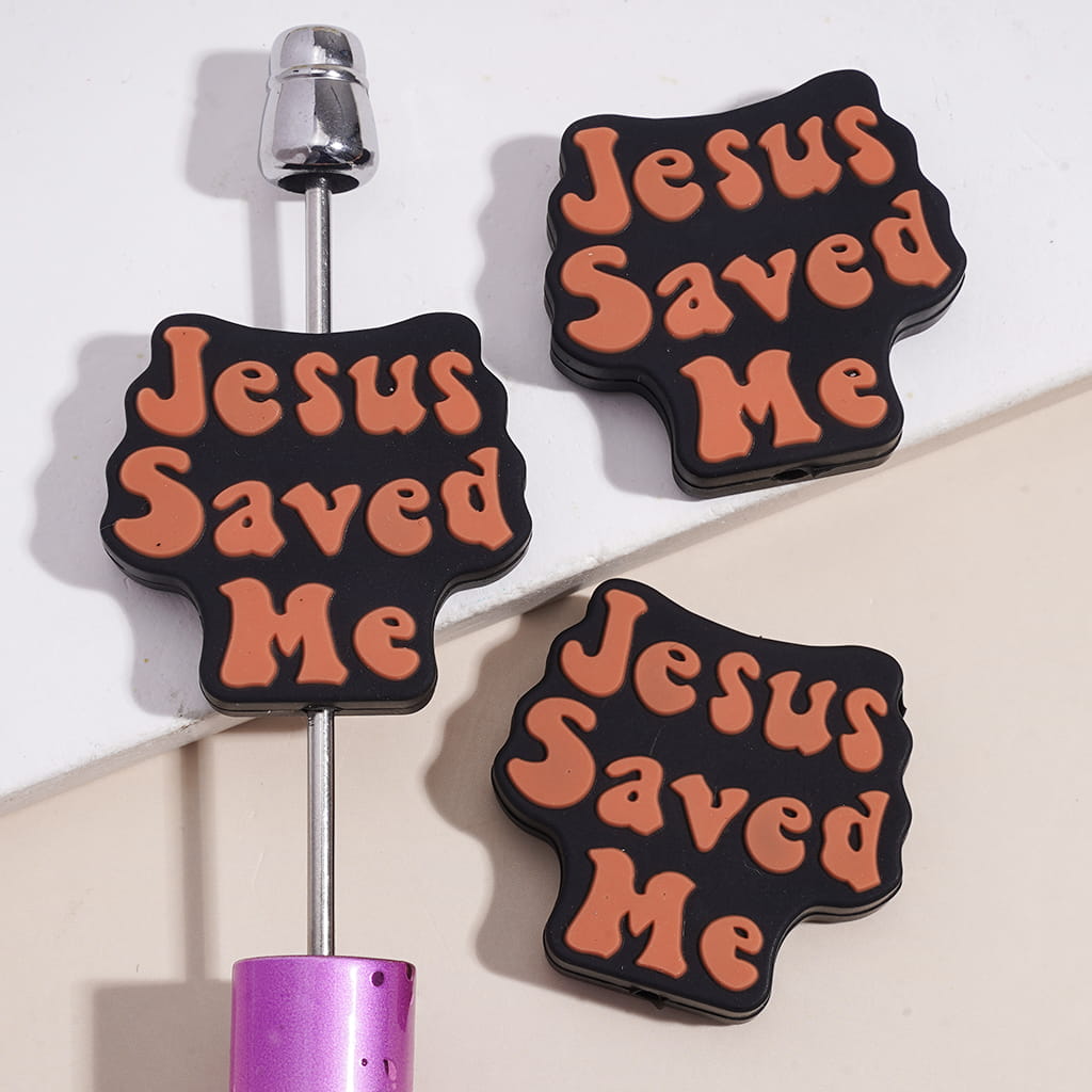 Silicone Focal Beads with Brown-Orange Text "Jesus Saved Me" on Black Background