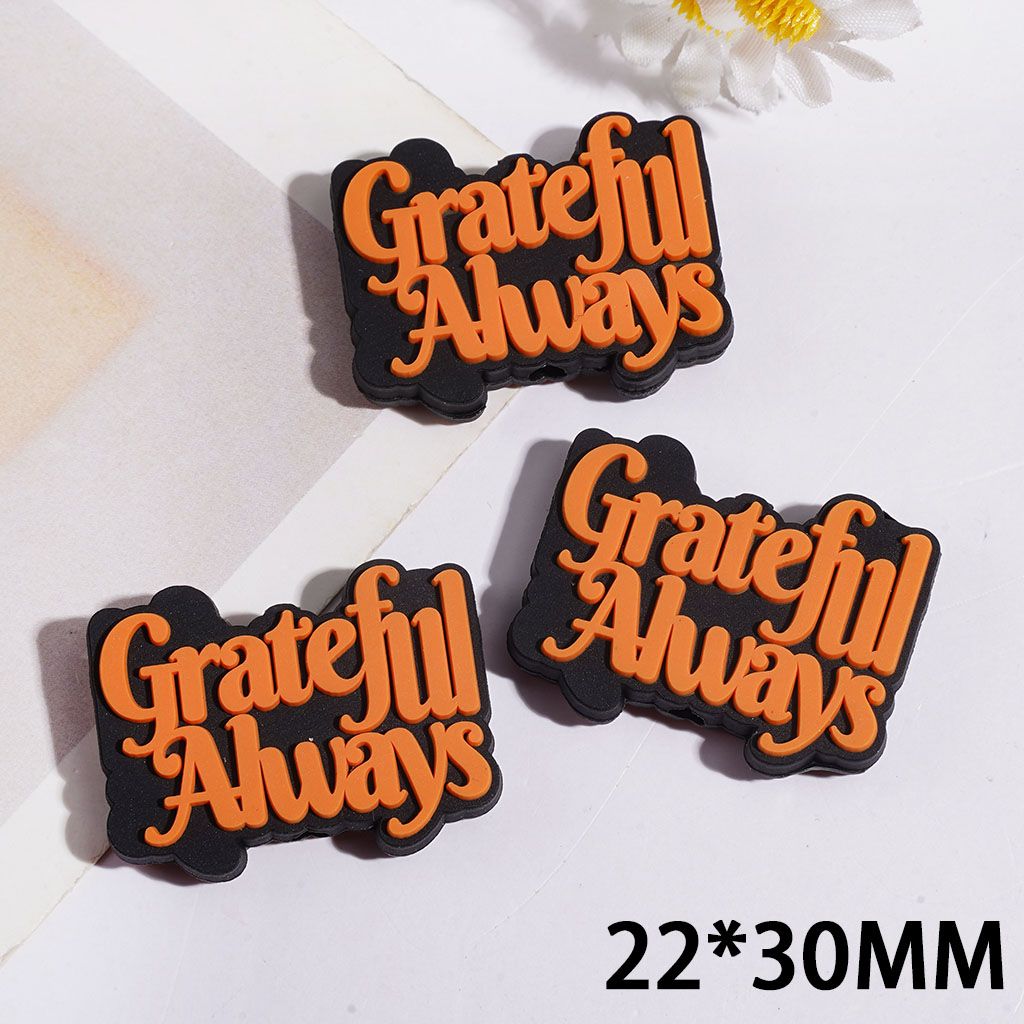 Silicone Focal Beads with Orange Text "Grateful Always" on Black Background, 22*30MM