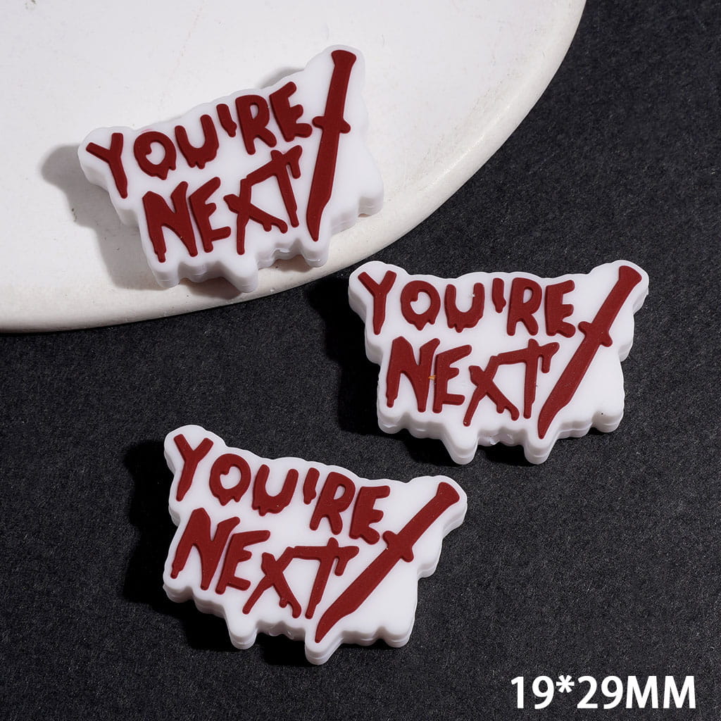 Silicone Focal Beads with Dark Red Brown Knife and Text "YOU'RE NEXT" on White Background, 19*29MM
