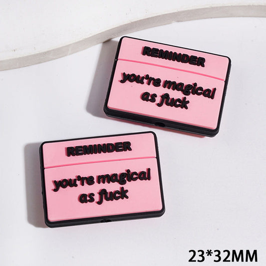 Silicone Focal Beads with Text "REMINDER YOU'RE MAGICAL AS HUMOR", Pink Background, Flat Rectangle Shape, 23*32M