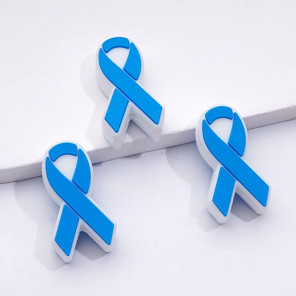 Three blue awareness ribbons on a white background

