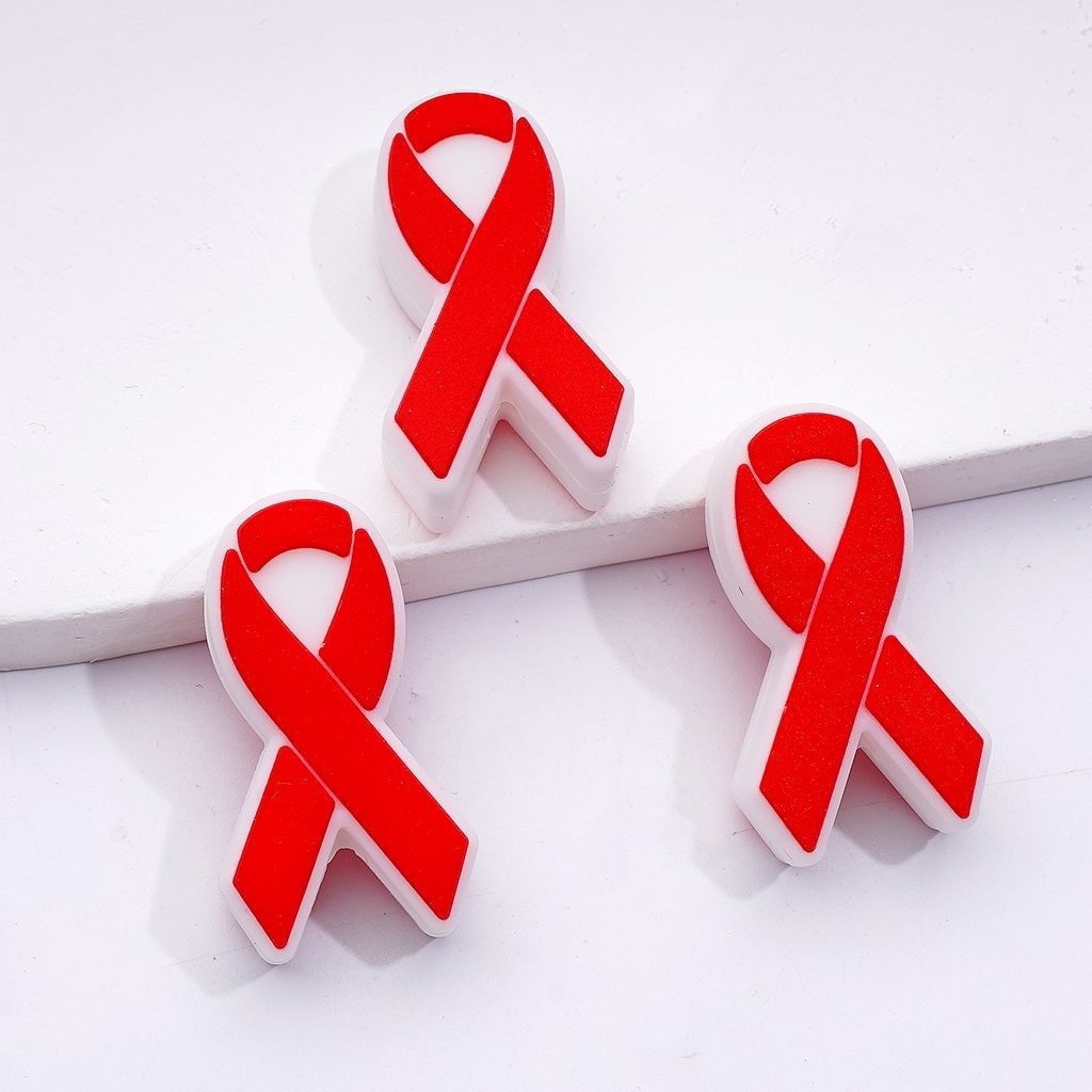 Three red ribbons on a white background

