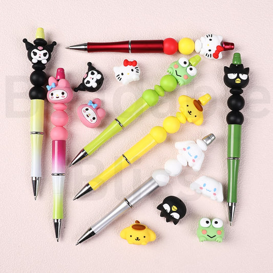 Set of colorful pens with cartoon character ends on a light pink background


