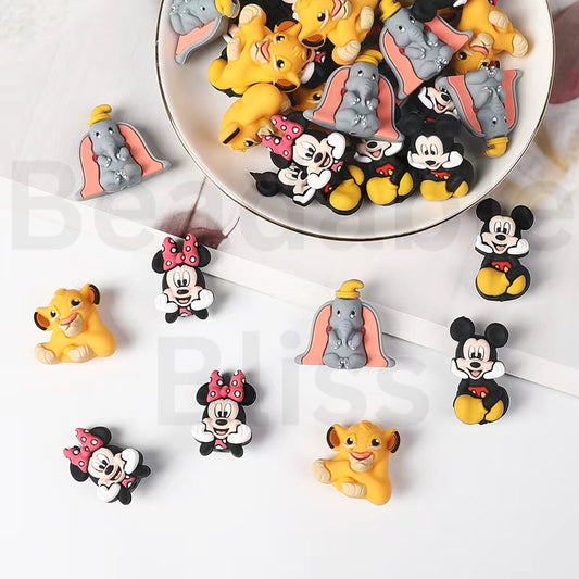 Collection of cartoon character figurines on a white background with 'beadablebliss' branding.

