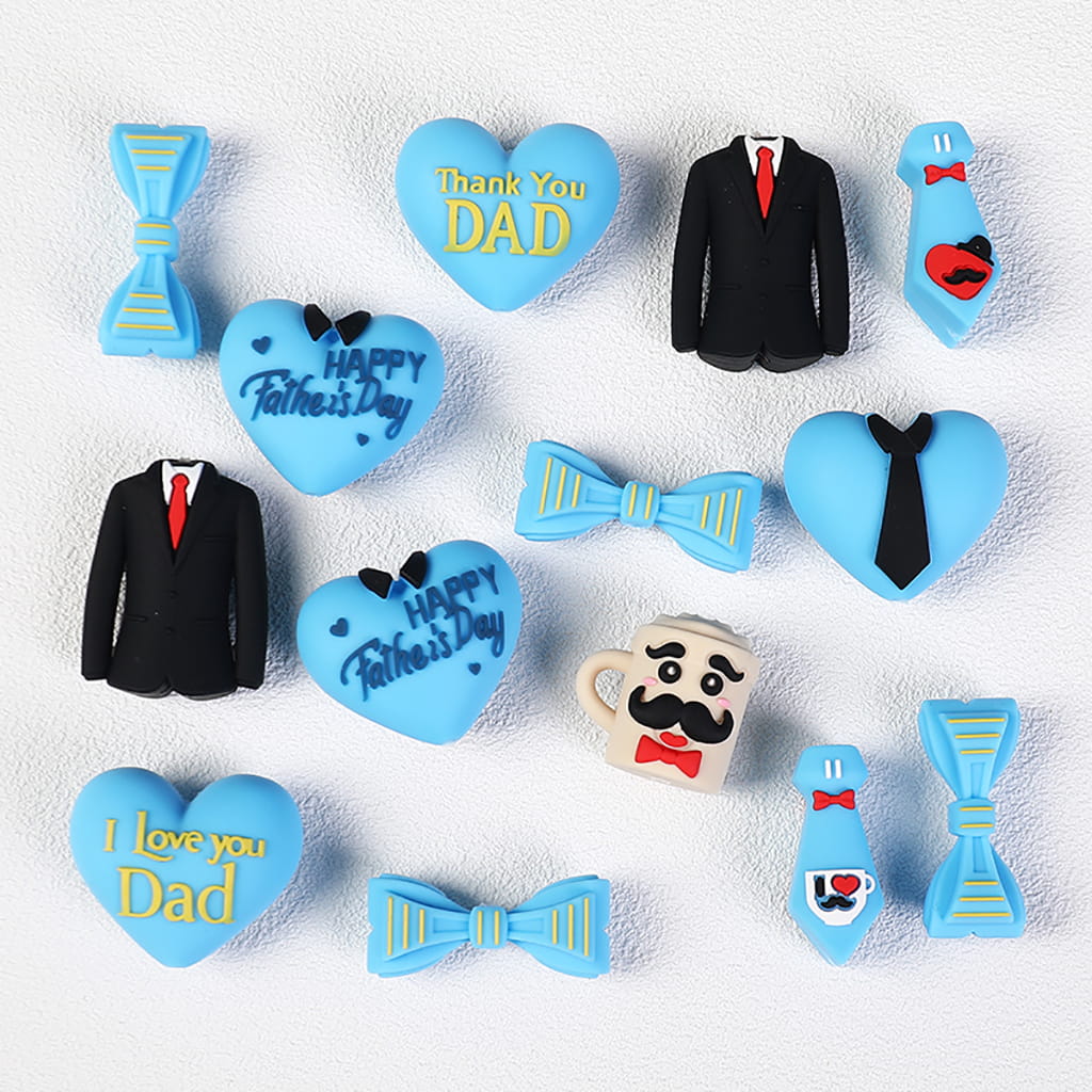 Collection of Father's Day-themed magnets on a white background