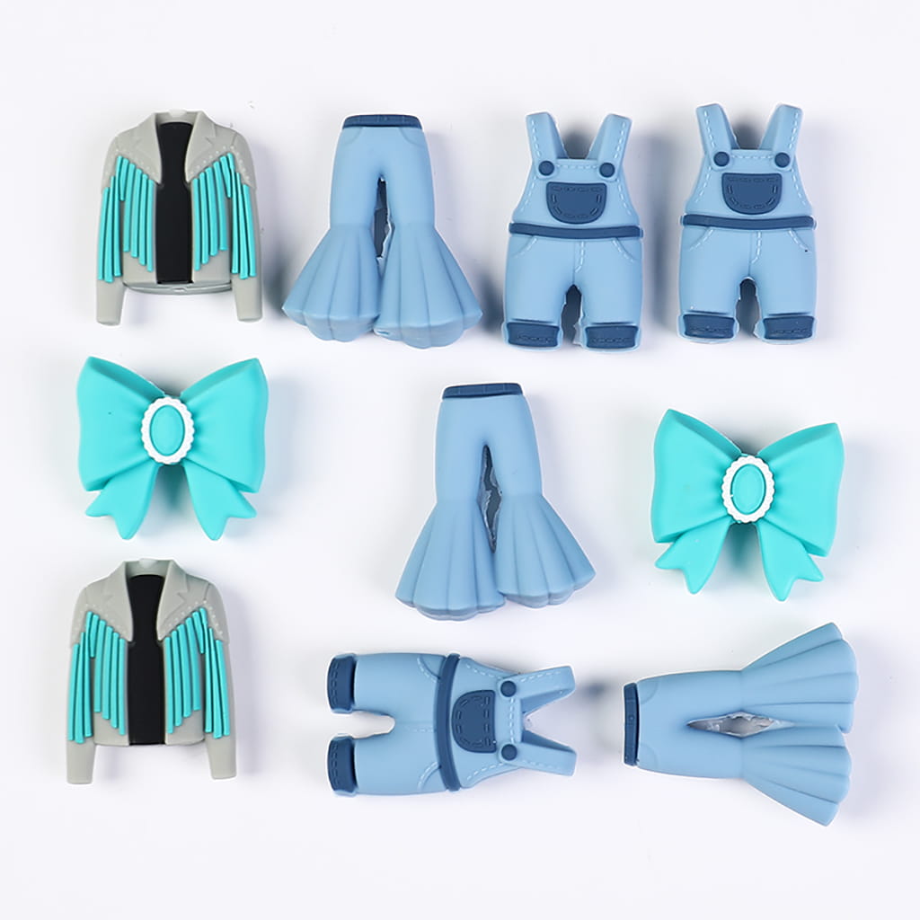 Collection of blue and gray clothing items including jackets, pants, and bows on a white background