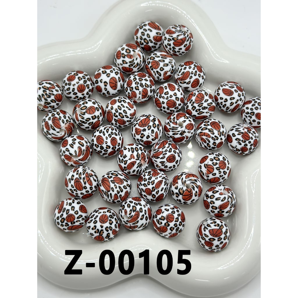 Polka dot beads with red and black patterns on a white dish, labeled Z-00105.

