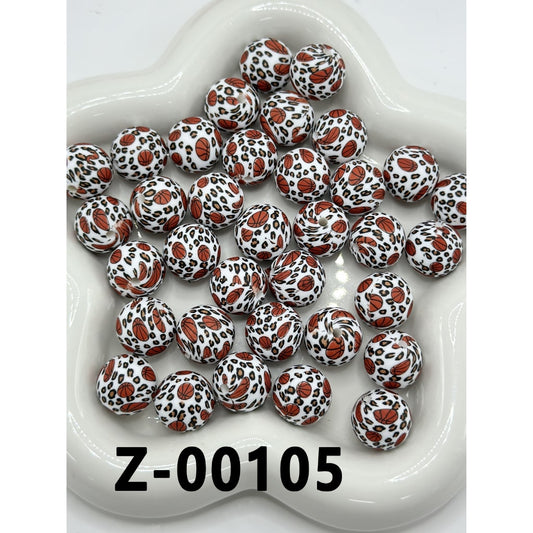 Polka dot beads with red and black patterns on a white dish, labeled Z-00105.

