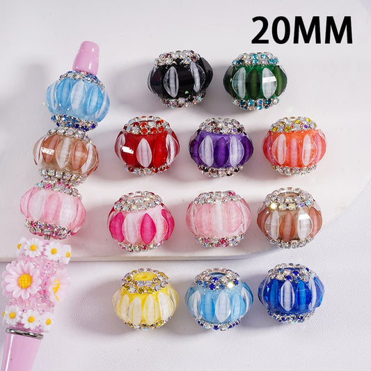 Colorful decorative beads with rhinestones on a white background, labeled '20MM'.

