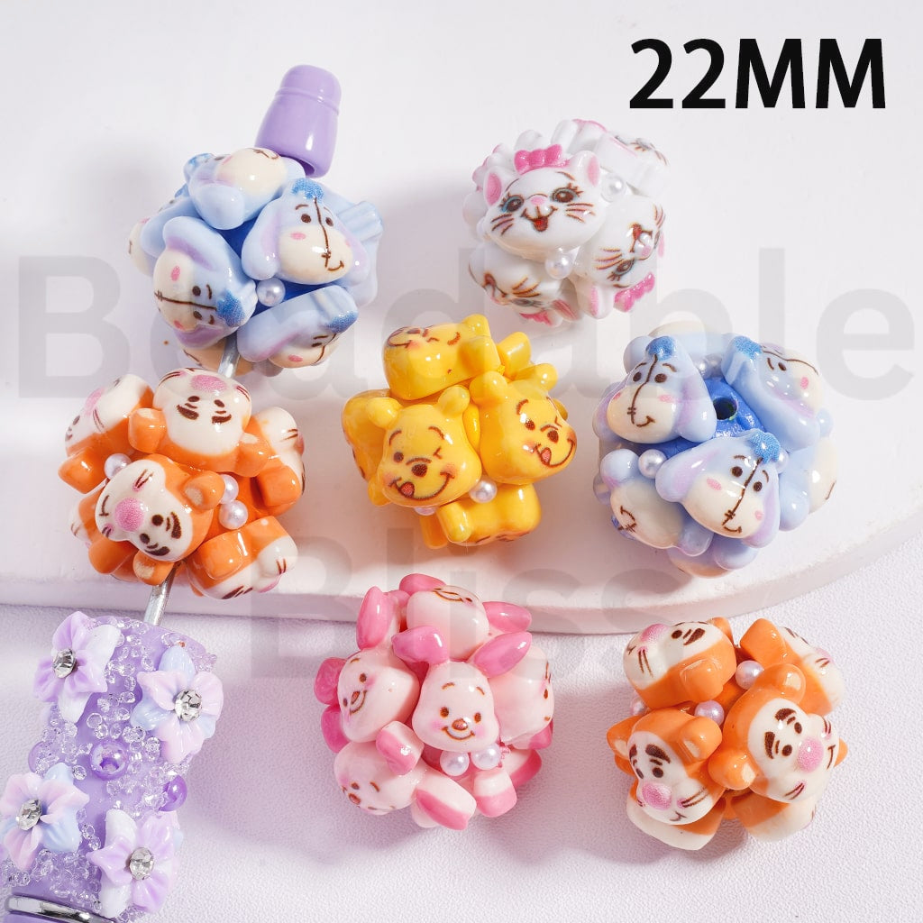Set of colorful cartoon character hair ties on a white background

