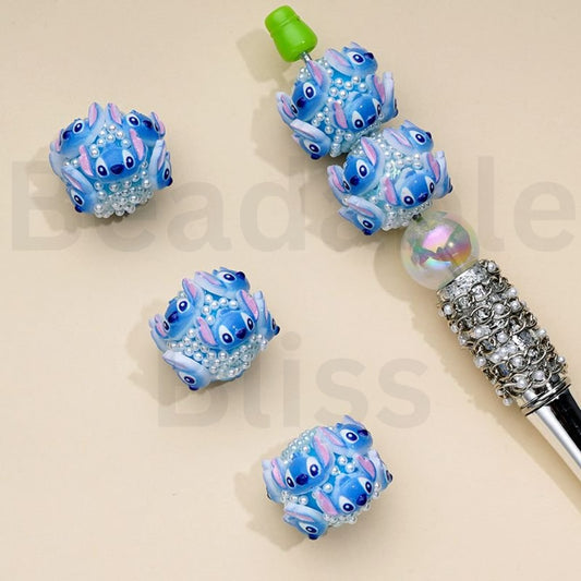 Decorative pen with blue character accents on a beige background