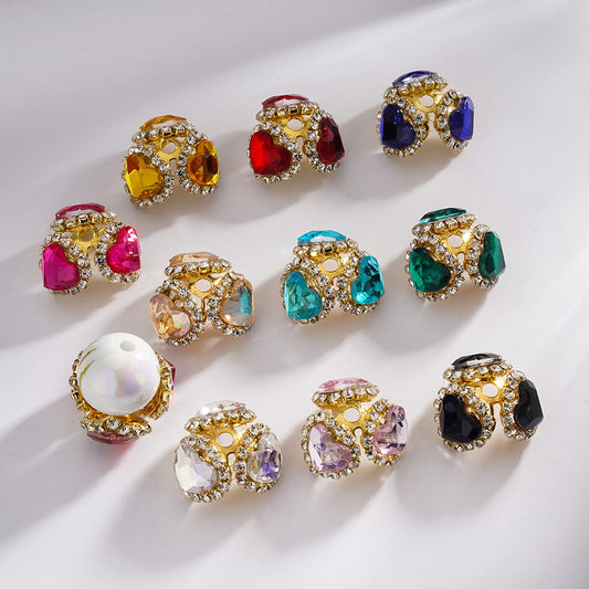 Colorful gemstone beads on a light background