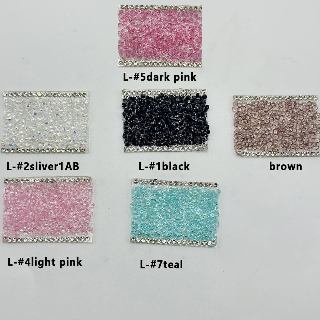 Various colors of clear rhinestone chains for pen embellishments, displayed on a white background.

