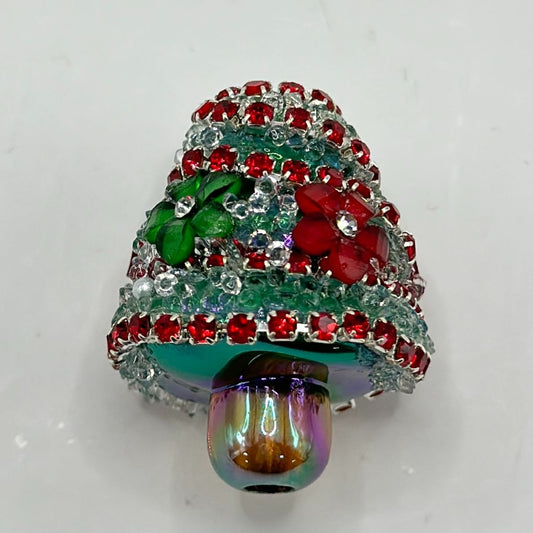 A set of acrylic beads designed to resemble small flowers with Christmas tree decorations, featuring red, green, and white colors with rhinestone embellishments.

