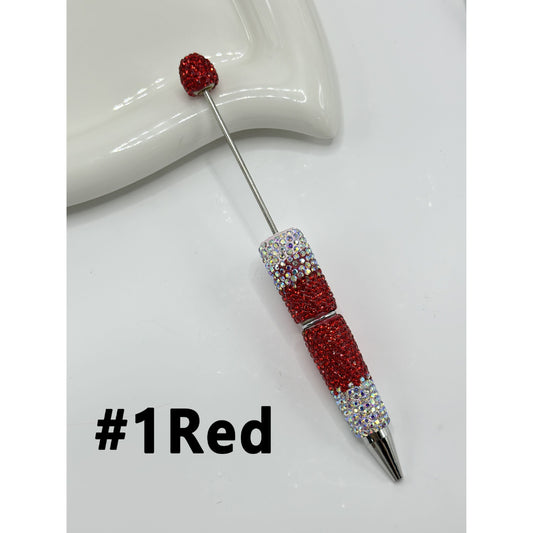 A collection of beadable pens covered with rhinestones in various colors, labeled with numbers from #1 to #8.

