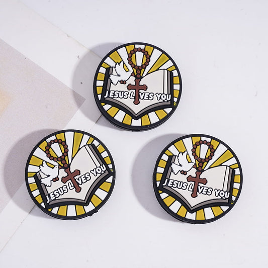 Three circular stickers with 'Jesus Loves You' text and design on a white background