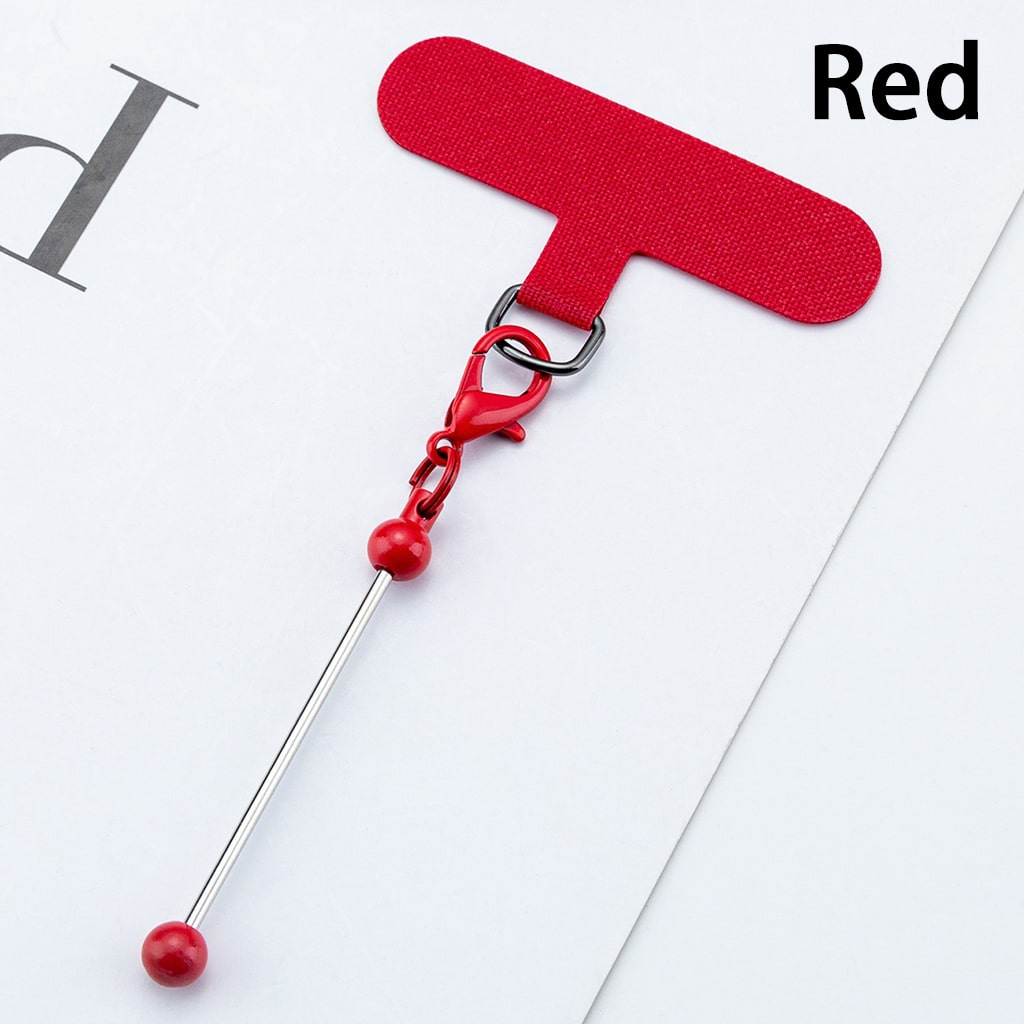 Red swizzle stick with a clip on a white background