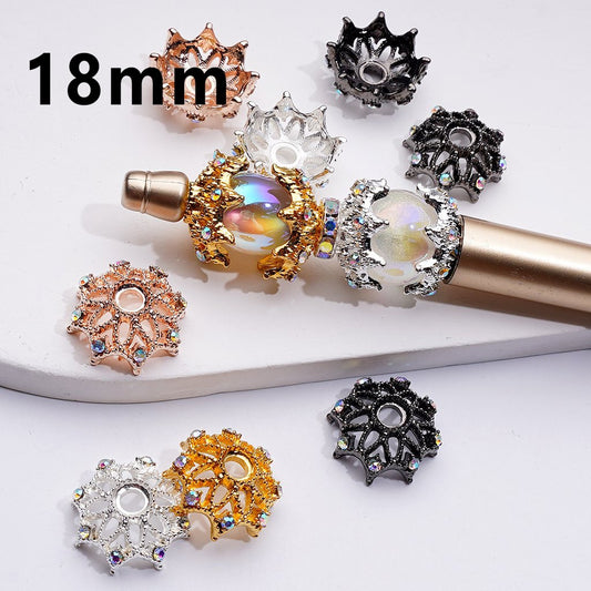 Decorative metal components with gemstones on a white background, labeled '18mm'.

