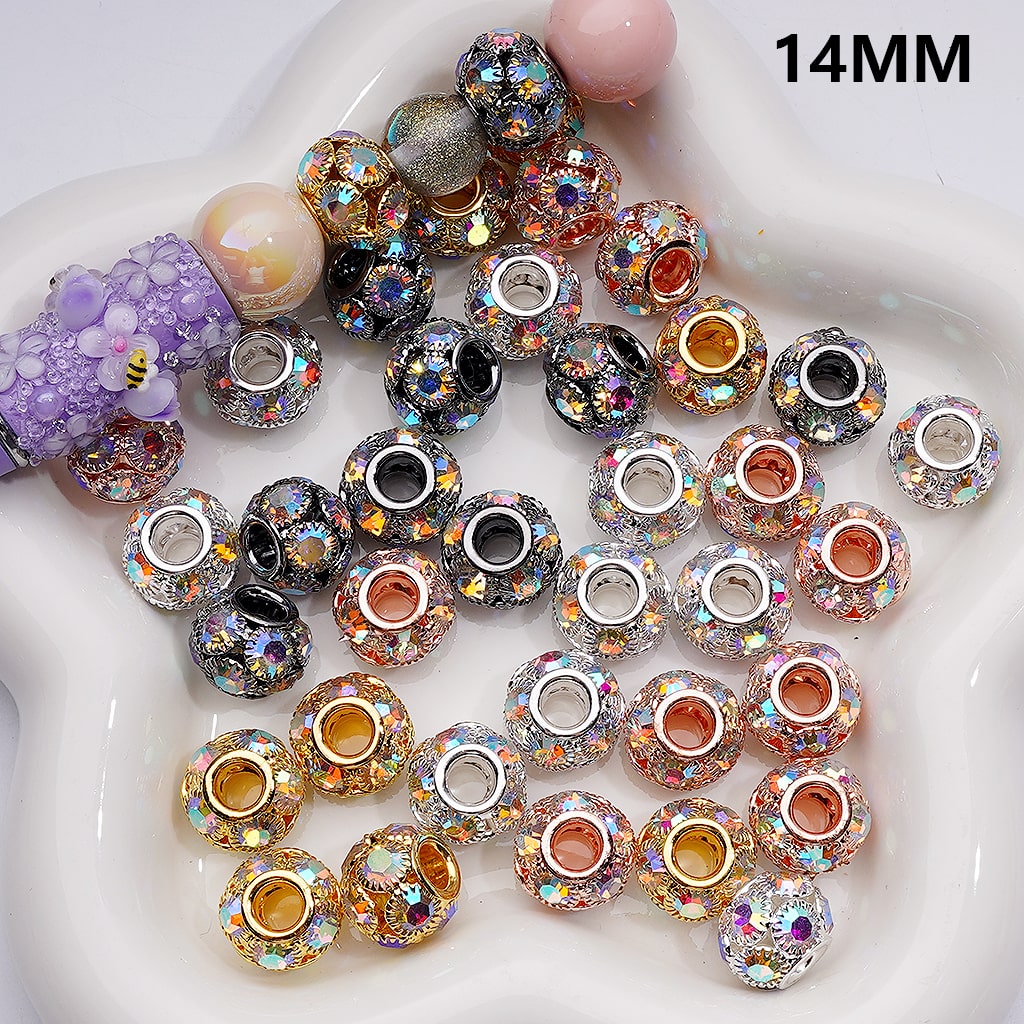 Assorted colorful beads with rhinestones on a white surface, labeled '14MM'.


