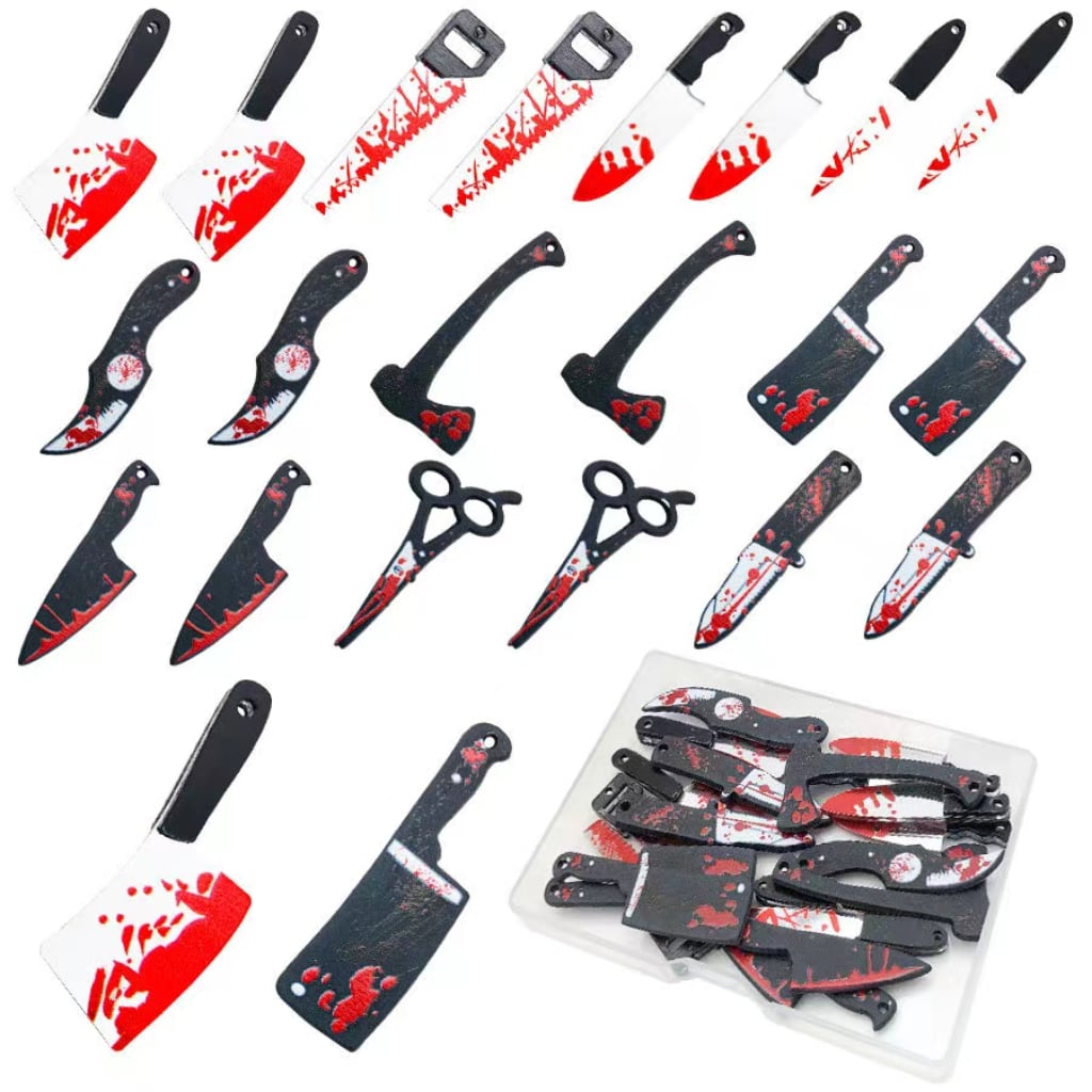 Collection of knives and tools with blood-themed designs on a white background

