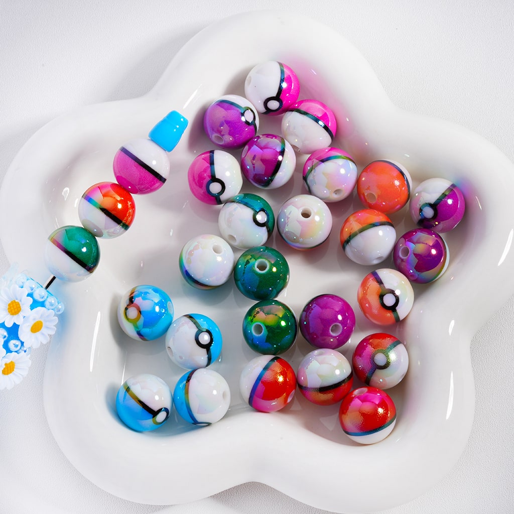 Colorful beads on a white dish with a white background

