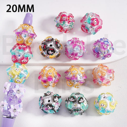 Colorful decorative beads with cartoon character designs on a white background

