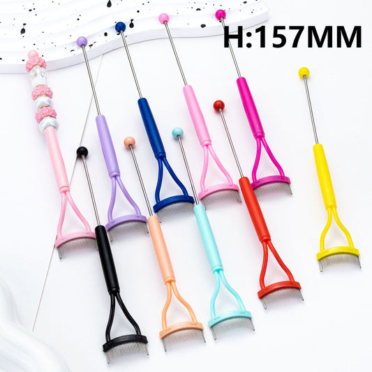 Set of colorful pet grooming tools with handles on a white background

