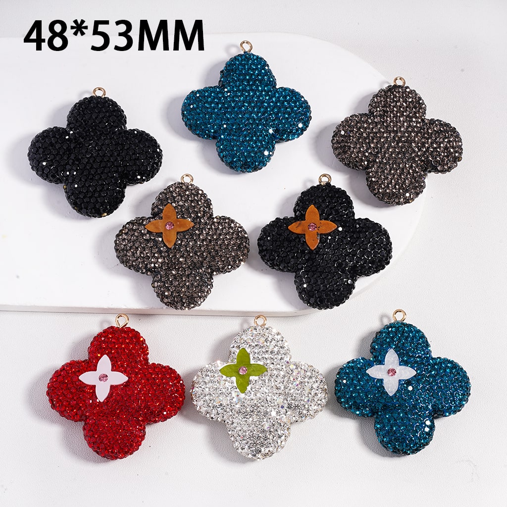 Assorted flower-shaped earrings on a white background with dimensions 48*53MM.

