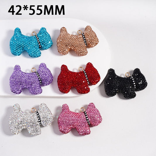 Set of colorful dog-shaped keychains on a white background with dimensions 42*55MM.

