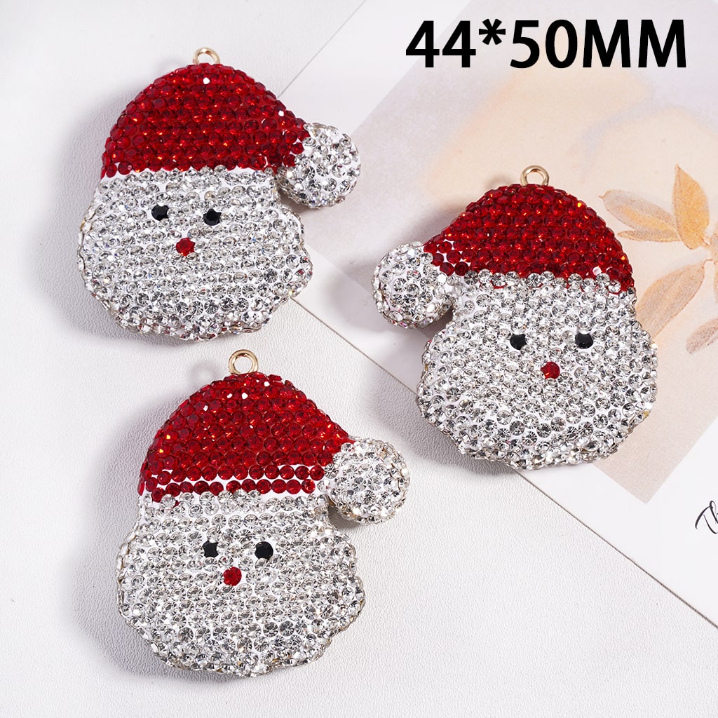 Three rhinestone Santa Claus decorations on a white background with '44*50MM' text.

