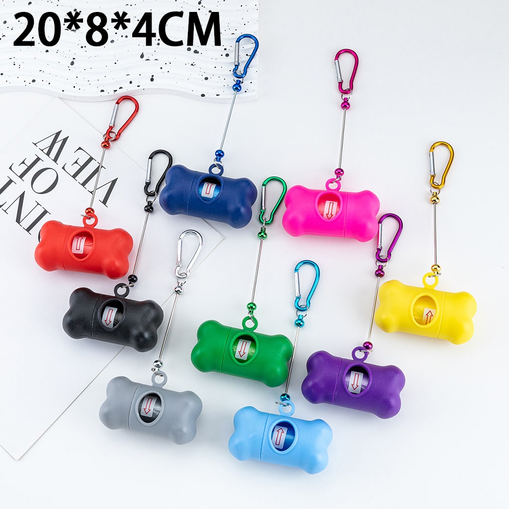 Colorful dog training clickers with carabiners on a white background