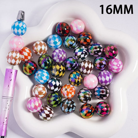 Colorful checkered beads on a white dish with a pink tool, labeled '16MM'.